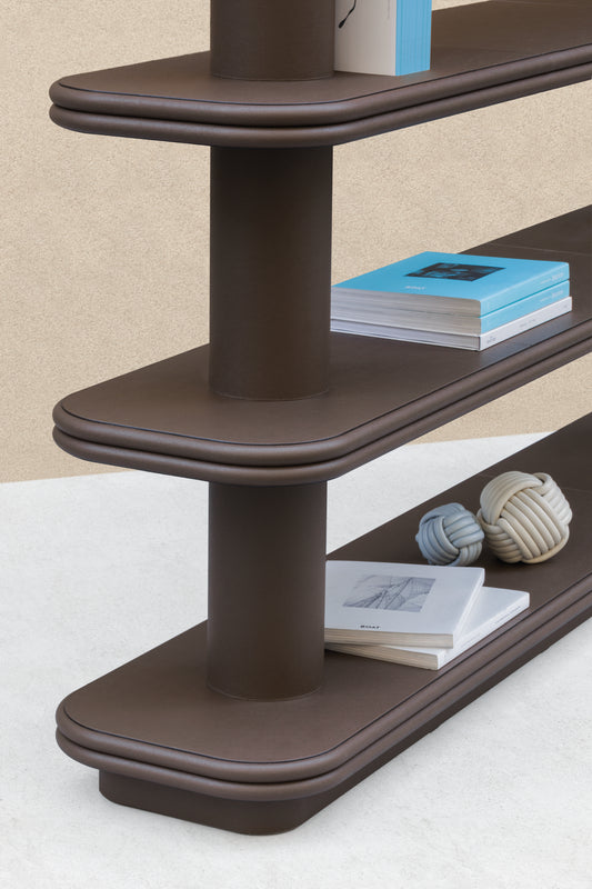 Giobagnara × Stéphane Parmentier Scala | Leather Single Bookshelf: Leather-wrapped structure with cylindrical supports and rounded shelves in golf, wild boar, deer, nappa, or suede finishes | Furniture / Bookcases | 2Jour Concierge, your luxury lifestyle shop | refined interiors, luxury offices, contemporary libraries, boutique hotels, collector’s furniture, design statements