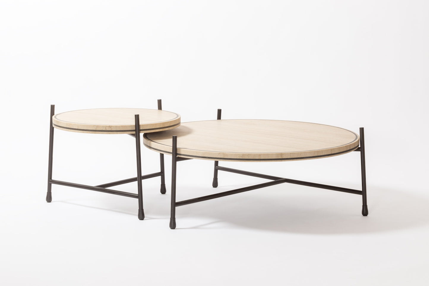 Giobagnara × Stéphane Parmentier Oblivion | Round Travertine Coffee Table: Travertine top with slim metal legs in bronze or white, available in classic or titanium finishes | Furniture / Coffee Tables | 2Jour Concierge, your luxury lifestyle shop | luxury interiors, elegant living, hospitality décor, boutique hotels, yacht décor, executive offices, refined lifestyle