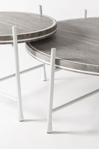 Giobagnara × Stéphane Parmentier Oblivion | Round Travertine Coffee Table: Travertine top with slim metal legs in bronze or white, available in classic or titanium finishes | Furniture / Coffee Tables | 2Jour Concierge, your luxury lifestyle shop | luxury interiors, elegant living, hospitality décor, boutique hotels, yacht décor, executive offices, refined lifestyle