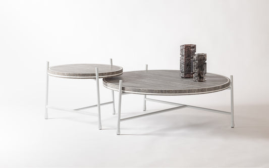 Giobagnara × Stéphane Parmentier Oblivion | Round Travertine Coffee Table: Travertine top with slim metal legs in bronze or white, available in classic or titanium finishes | Furniture / Coffee Tables | 2Jour Concierge, your luxury lifestyle shop | luxury interiors, elegant living, hospitality décor, boutique hotels, yacht décor, executive offices, refined lifestyle