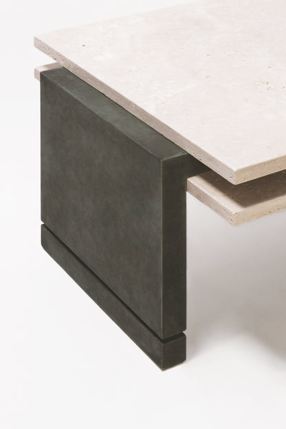 Giobagnara × Stéphane Parmentier Stratos | Marble Coffee Table: Travertine top with suede base | Furniture / Coffee Tables | 2Jour Concierge, your luxury lifestyle shop | luxury interiors, boutique hotels, refined living, hospitality décor, yacht décor, modern minimalism, executive offices