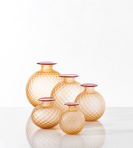 Monofiori Balloton Vase by Venini | Small blown glass vials resembling ancient treasures, delicately crafted with caps and curious floret-like details | Murano glass | Available in matte transparent or glossy transparent finishes | Home Decor Vases | 2Jour Concierge, your luxury lifestyle shop