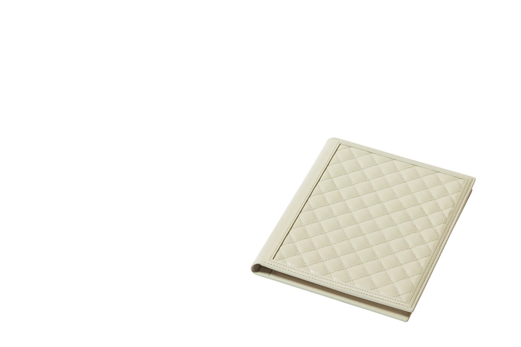 Rivière Diamonds Notepad Holder | Leather notepad holder featuring a padded quilted diamonds pattern with a side pencil holder and pen | Includes a notepad made of 70 ivory paper sheets | Available in small (A6), medium (A5), and large (A4) sizes | Office Accessories | 2Jour Concierge, your luxury lifestyle shop