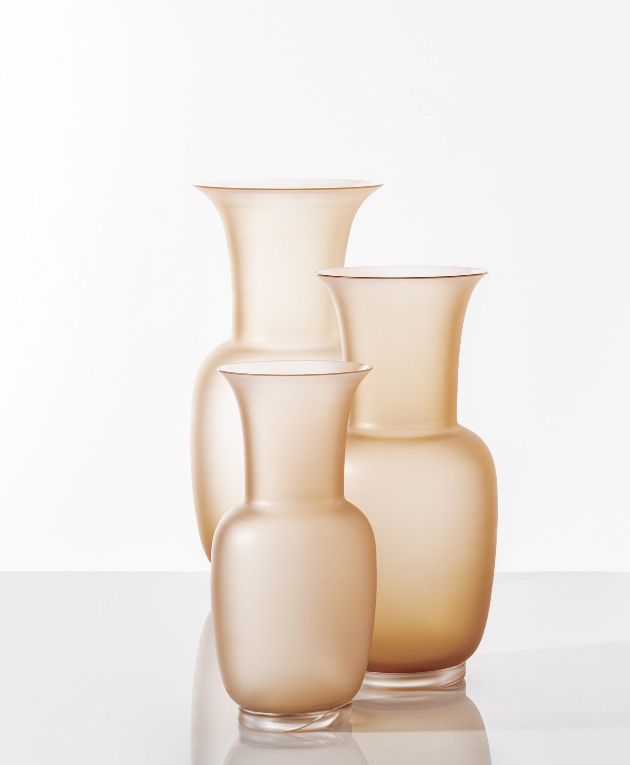 Opalino Vase by Venini | Handmade blown glass vase embodying elegance with pure, essential lines | Made of Murano glass | Available in matte or glossy, opale or transparent finishes | Home Decor Vases | 2Jour Concierge, your luxury lifestyle shop
