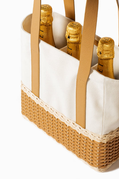 Pigment France Talais Bottle Carrier | Rigid base in woven leather and rattan with soft cream-colored cotton lining and partitions for bottles | Long shiny calfskin handles add elegance and functionality | Sophisticated design enhancing premium materials | Can accommodate multiple bottles | Home Decor and Accessories | 2Jour Concierge, your luxury lifestyle shop