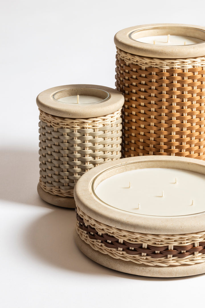 Pigment France × Giobagnara Courbet Travertine Candle Holder (Regular) | Marble candle holder with woven leather and rattan covering, complete with removable wax candle | Décor / Vases + Candle Holders | 2Jour Concierge, your luxury lifestyle shop | luxury interiors, refined lifestyle, hospitality décor, designer home accessories, boutique hotels, yacht décor, elegant living, office décor