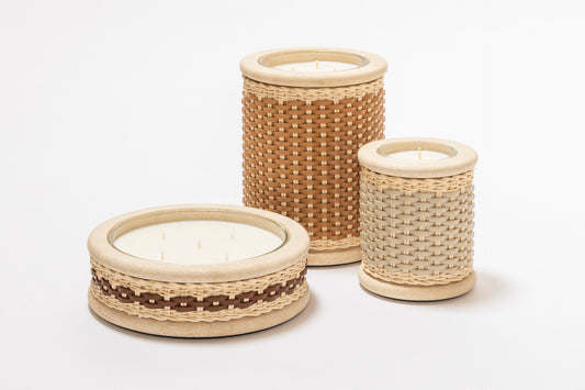 Pigment France × Giobagnara Courbet Travertine Candle Holder (Regular) | Marble candle holder with woven leather and rattan covering, complete with removable wax candle | Décor / Vases + Candle Holders | 2Jour Concierge, your luxury lifestyle shop | luxury interiors, refined lifestyle, hospitality décor, designer home accessories, boutique hotels, yacht décor, elegant living, office décor