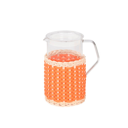 Pigment France Marseille Leather & Rattan Glass Pitcher | Transparent borosilicate glass partially dressed in woven leather and rattan | Features a glass lid with silicone ring and heat-resistant glass body | Suitable for both hot and cold drinks | Home Decor and Serveware | 2Jour Concierge, your luxury lifestyle shop