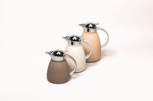Chantilly Carafe by Pigment France | Partially leather-covered insulated stainless steel carafe with chrome-plated finish. Two-chamber stainless steel structure maintains liquid’s warm temperatures for up to 12 hours and cold temperatures for up to 24 hours | Tableware and Drinkware | 2Jour Concierge, your luxury lifestyle shop