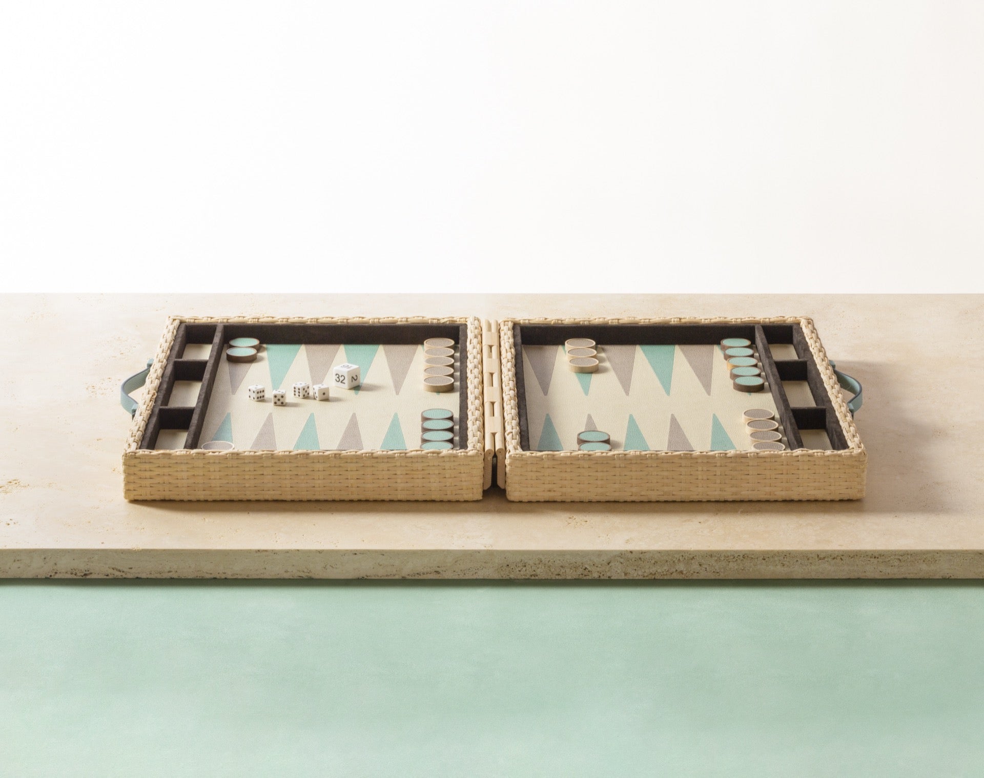 Pigment France Monte-Carlo Backgammon Case | Luxury backgammon set in woven rattan with leather details and inlaid playing surface | Games / Backgammon Sets | 2Jour Concierge, your luxury lifestyle shop | luxury interiors, hospitality décor, refined lifestyle, designer home accessories, boutique hotels, yacht décor, executive interiors, elegant living