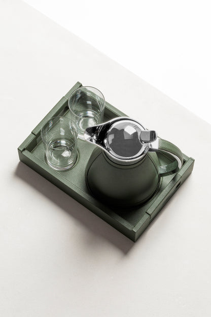 
Pigment France Beaubourg Nesting Tray Set | Includes a small Beaubourg tray with dedicated spaces for perfect stability, hosting two fine crystal glasses and one carafe | Compatible with the following carafes: Chantilly 0.6L, Monceau 0.6L, Vincennes 0.6L | Carafes: Partially leather-covered insulated stainless steel with chrome-plated finish | Beaubourg Tray: Leather-covered wood structure | Elegant and functional design | Home Decor and Serveware | 2Jour Concierge, your luxury lifestyle shop