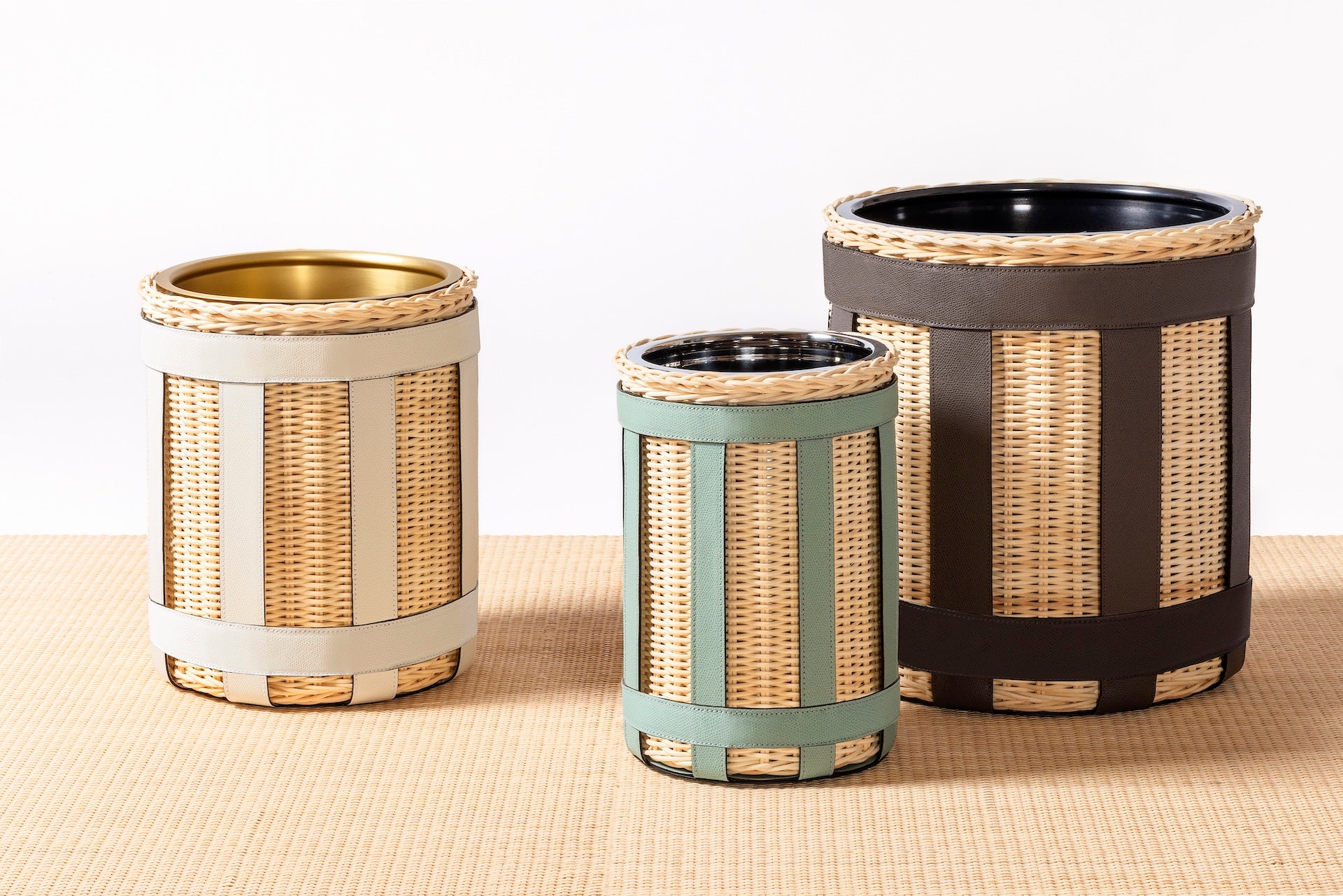 Pigment France × Gio Minelli Sillon Bin | Storage bin in natural rattan with leather trim and polished chrome, bronze or brass finish | Storage / Bins | 2Jour Concierge, your luxury lifestyle shop | luxury interiors, hospitality décor, designer home accessories, boutique hotels, refined lifestyle, yacht décor, office décor, executive interiors