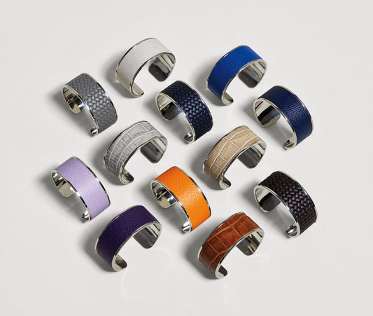 Pinetti Napkin Ring | Chrome or satin brass finishing with a leather insert | Stylish and sophisticated design | Ideal for enhancing any table setting | Home Decor and Serveware | 2Jour Concierge, your luxury lifestyle shop