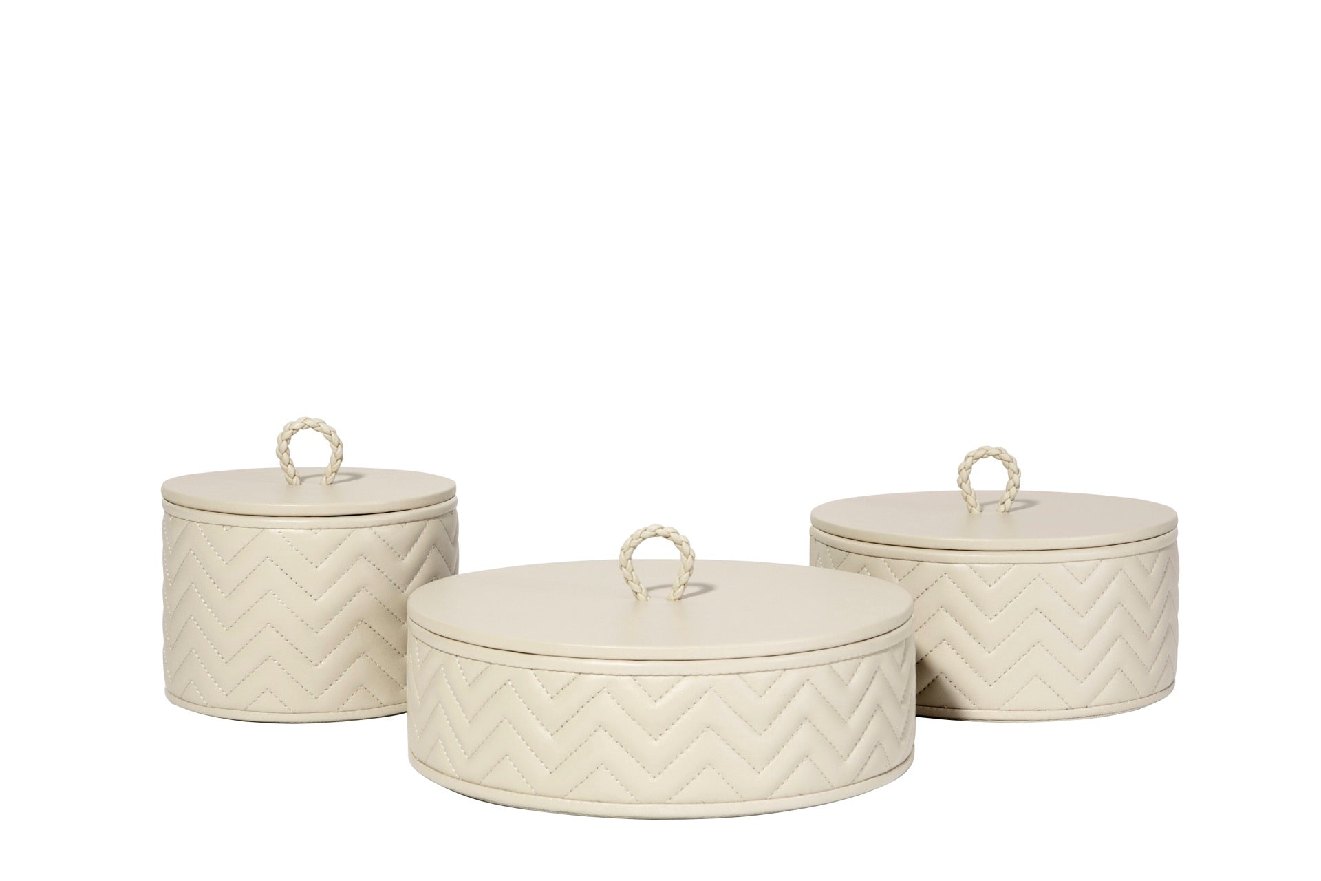 Riviere Jana | Round Box: Quilted leather box with lid, available in handwoven, diamond, or herringbone patterns, offered in multiple sizes for elegant storage and display | Decor / Trinket Boxes | 2Jour Concierge, your luxury lifestyle shop | luxury interiors, hospitality décor, elegant living, designer home accessories, boutique hotels, refined lifestyle, yacht décor, executive interiors