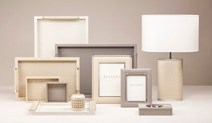 Riviere Livia Handwoven | Table Lamp: Oval lamp with handwoven leather structure, chrome or gold metal details, and oval shade, designed for sophisticated living spaces | Lighting / Table Lamps | 2Jour Concierge, your luxury lifestyle shop | luxury interiors, hospitality décor, elegant living, designer lighting, boutique hotels, refined lifestyle, yacht décor