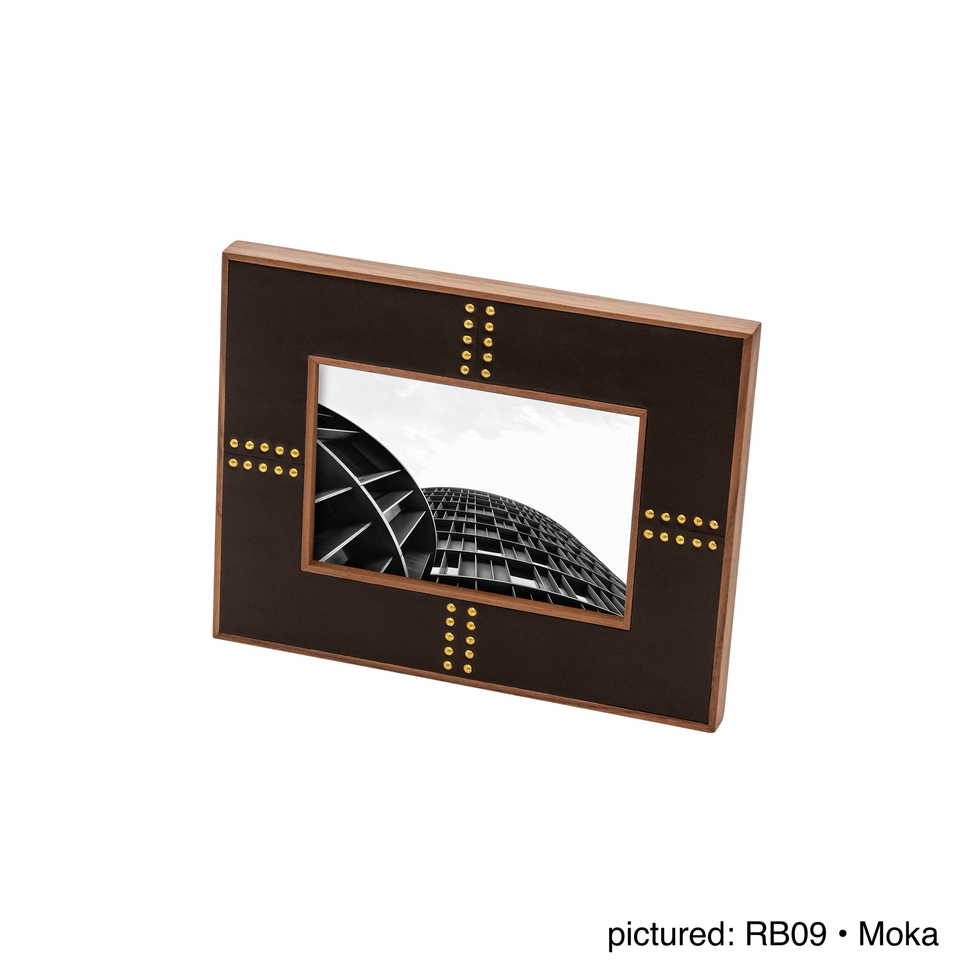 Rabitti 1969 | Toiles de Noyer Walnut Wood and Saddle Leather Picture Frame N°1: Walnut wood picture frame with saddle leather inserts and golden tacks, two sizes, magnetic back | Decor | 2Jour Concierge, your luxury lifestyle shop | luxury picture frame, Rabitti 1969, Toiles de Noyer, walnut leather frame, golden tack detail, Italian luxury decor, designer photo frame, Giobagnara leather frame