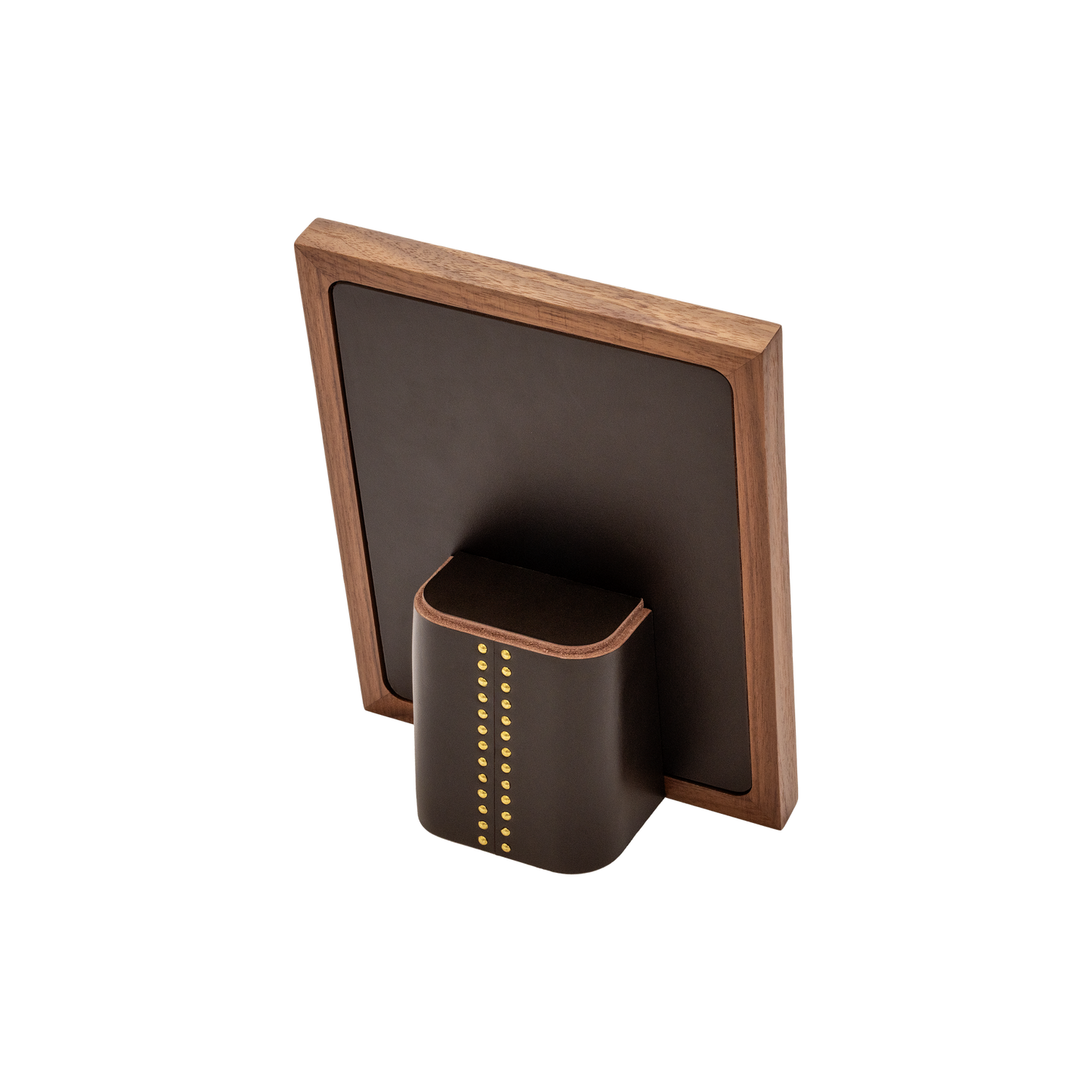 Rabitti 1969 | Toiles de Noyer Walnut Wood and Saddle Leather Picture Frame N°1: Walnut wood picture frame with saddle leather inserts and golden tacks, two sizes, magnetic back | Decor | 2Jour Concierge, your luxury lifestyle shop | luxury picture frame, Rabitti 1969, Toiles de Noyer, walnut leather frame, golden tack detail, Italian luxury decor, designer photo frame, Giobagnara leather frame