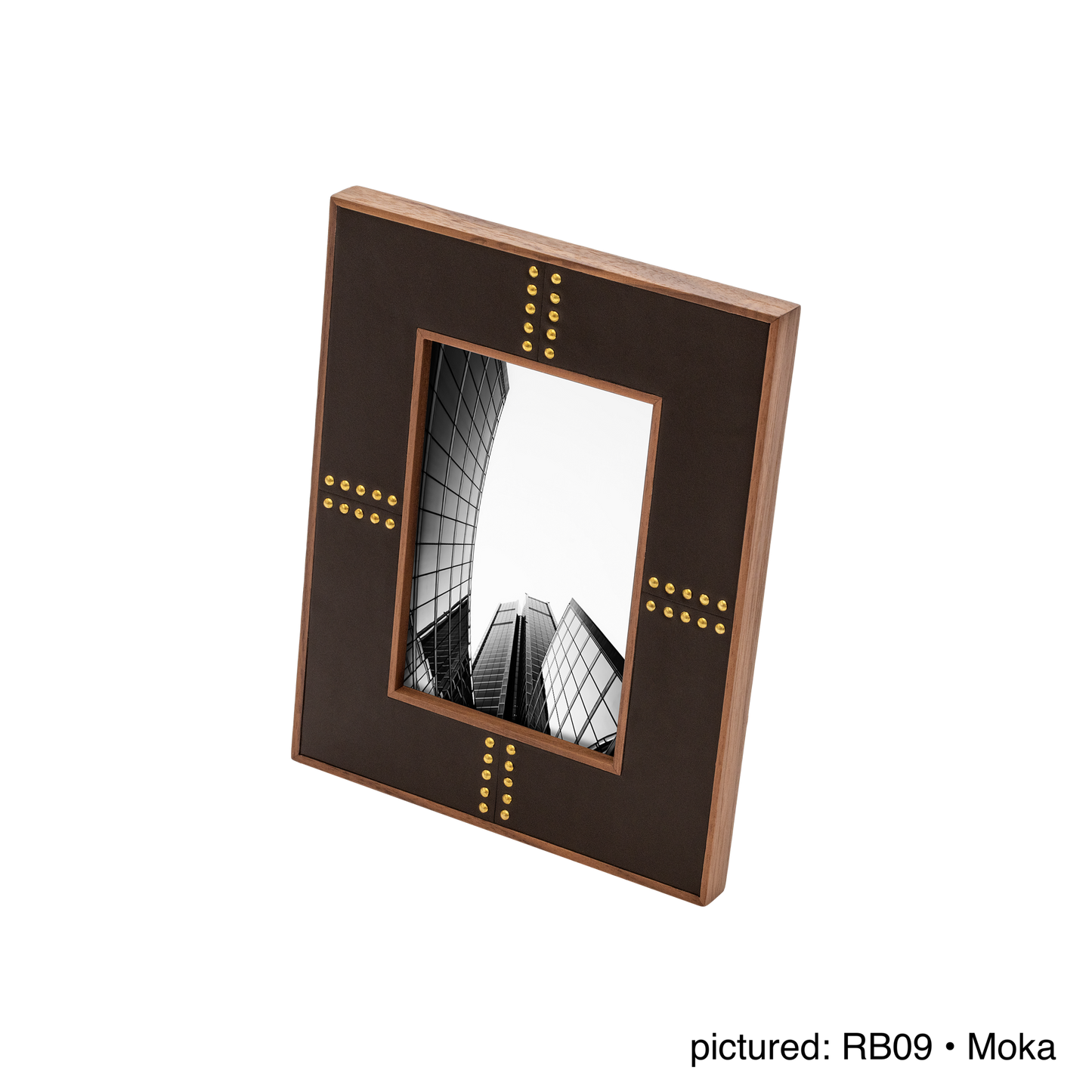 Rabitti 1969 | Toiles de Noyer Walnut Wood and Saddle Leather Picture Frame N°1: Walnut wood picture frame with saddle leather inserts and golden tacks, two sizes, magnetic back | Decor | 2Jour Concierge, your luxury lifestyle shop | luxury picture frame, Rabitti 1969, Toiles de Noyer, walnut leather frame, golden tack detail, Italian luxury decor, designer photo frame, Giobagnara leather frame