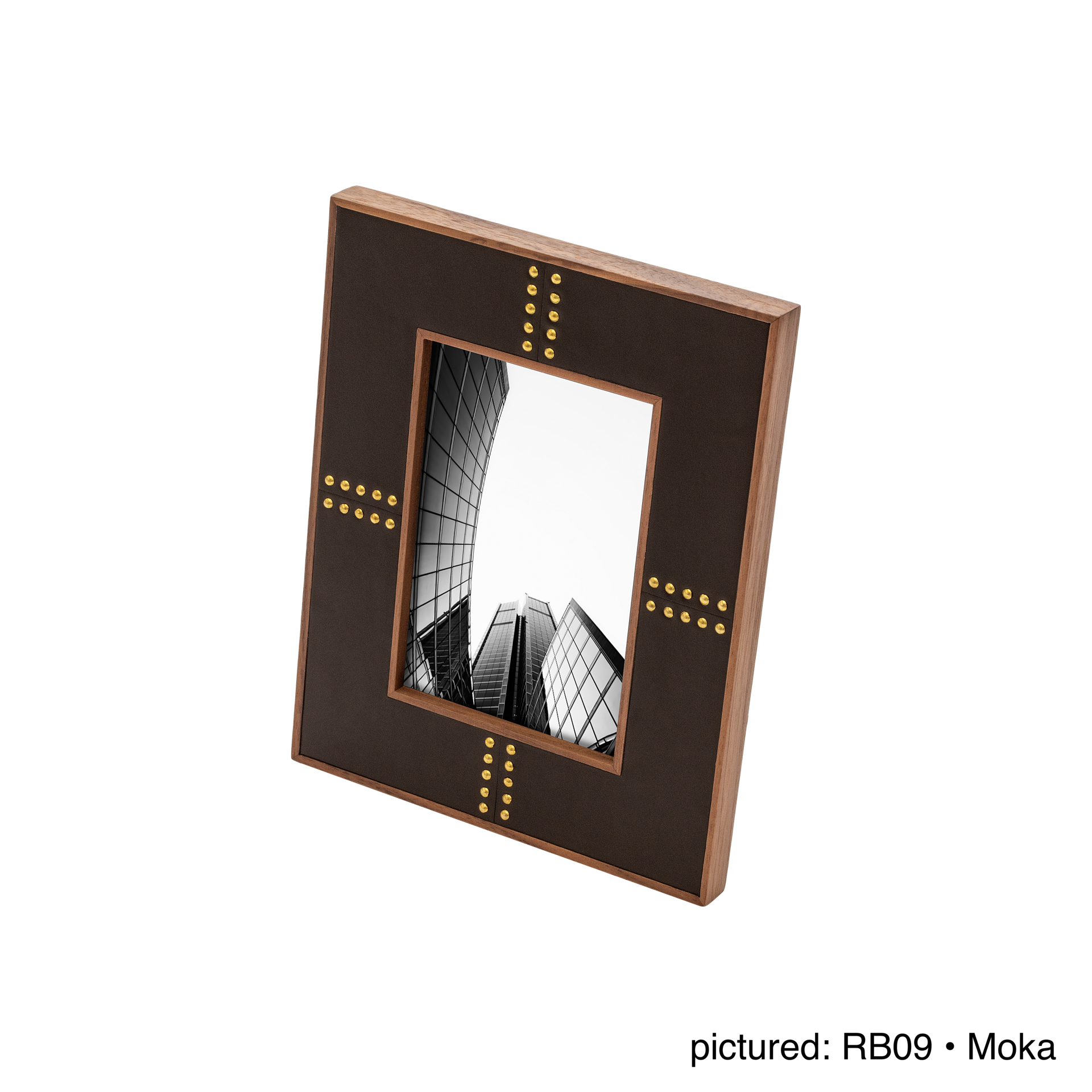 Rabitti 1969 | Toiles de Noyer Walnut Wood and Saddle Leather Picture Frame N°1: Walnut wood picture frame with saddle leather inserts and golden tacks, two sizes, magnetic back | Decor | 2Jour Concierge, your luxury lifestyle shop | luxury picture frame, Rabitti 1969, Toiles de Noyer, walnut leather frame, golden tack detail, Italian luxury decor, designer photo frame, Giobagnara leather frame