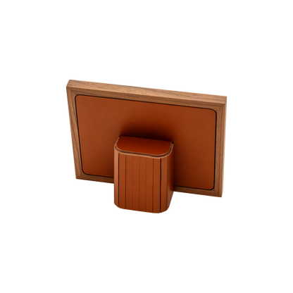 Rabitti 1969 | Toiles de Noyer Walnut Wood and Saddle Leather Picture Frame N°2: Walnut wood picture frame with saddle leather inserts engraved with vertical and horizontal stripes, two sizes, magnetic back | Decor | 2Jour Concierge, your luxury lifestyle shop | luxury picture frame, Rabitti 1969, Toiles de Noyer, walnut leather frame, engraved leather detail, Italian luxury decor, designer photo frame, Giobagnara leather frame