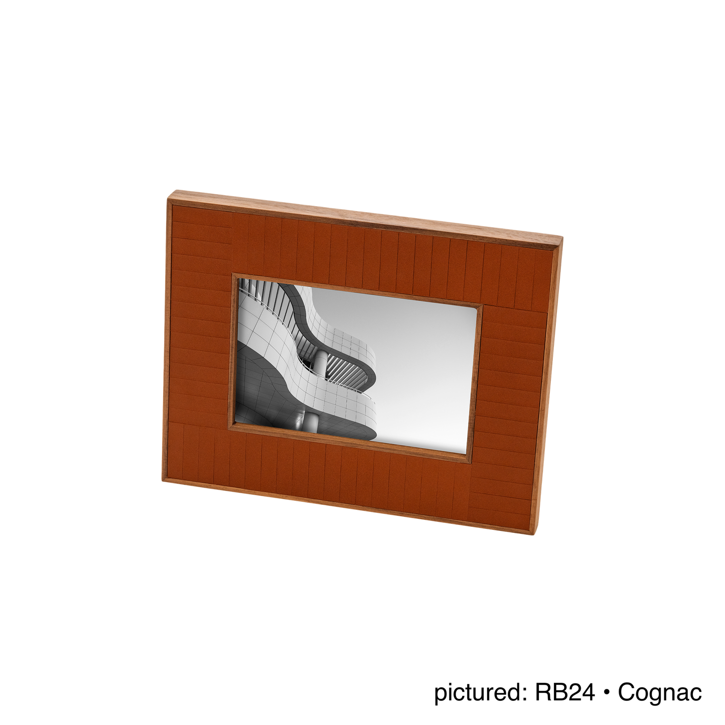Rabitti 1969 | Toiles de Noyer Walnut Wood and Saddle Leather Picture Frame N°2: Walnut wood picture frame with saddle leather inserts engraved with vertical and horizontal stripes, two sizes, magnetic back | Decor | 2Jour Concierge, your luxury lifestyle shop | luxury picture frame, Rabitti 1969, Toiles de Noyer, walnut leather frame, engraved leather detail, Italian luxury decor, designer photo frame, Giobagnara leather frame