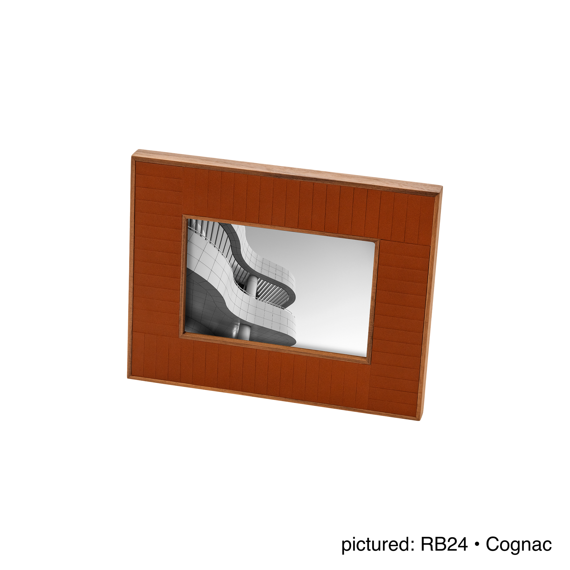 Rabitti 1969 | Toiles de Noyer Walnut Wood and Saddle Leather Picture Frame N°2: Walnut wood picture frame with saddle leather inserts engraved with vertical and horizontal stripes, two sizes, magnetic back | Decor | 2Jour Concierge, your luxury lifestyle shop | luxury picture frame, Rabitti 1969, Toiles de Noyer, walnut leather frame, engraved leather detail, Italian luxury decor, designer photo frame, Giobagnara leather frame