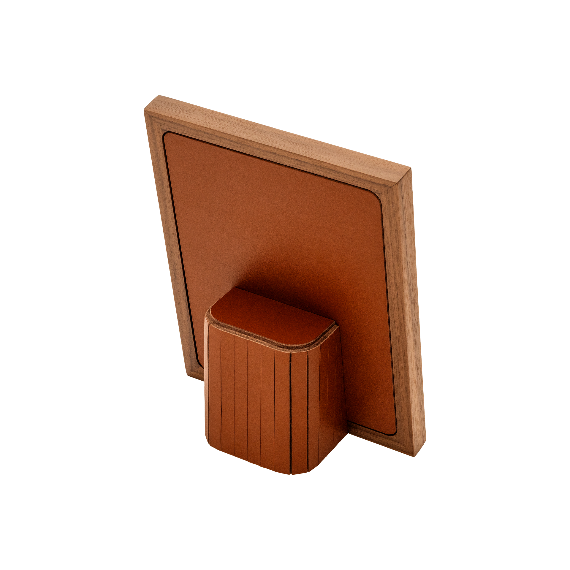 Rabitti 1969 | Toiles de Noyer Walnut Wood and Saddle Leather Picture Frame N°2: Walnut wood picture frame with saddle leather inserts engraved with vertical and horizontal stripes, two sizes, magnetic back | Decor | 2Jour Concierge, your luxury lifestyle shop | luxury picture frame, Rabitti 1969, Toiles de Noyer, walnut leather frame, engraved leather detail, Italian luxury decor, designer photo frame, Giobagnara leather frame