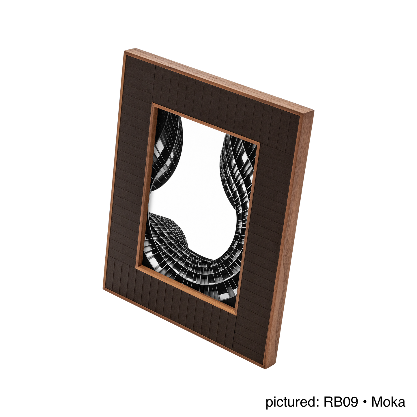 Rabitti 1969 | Toiles de Noyer Walnut Wood and Saddle Leather Picture Frame N°2: Walnut wood picture frame with saddle leather inserts engraved with vertical and horizontal stripes, two sizes, magnetic back | Decor | 2Jour Concierge, your luxury lifestyle shop | luxury picture frame, Rabitti 1969, Toiles de Noyer, walnut leather frame, engraved leather detail, Italian luxury decor, designer photo frame, Giobagnara leather frame