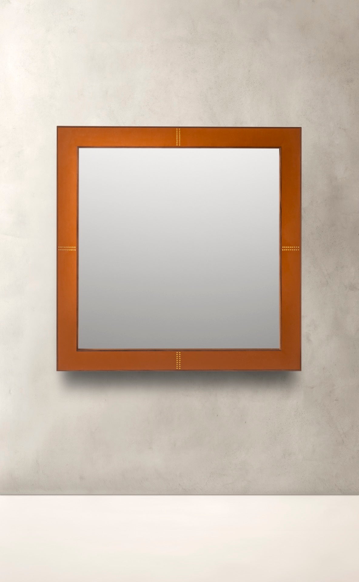 Rabitti 1969 | Toiles de Noyer Mirror N°1: Walnut wood frame with saddle leather inserts and golden tacks — square and rectangular | Furniture | 2Jour Concierge, your luxury lifestyle shop | luxury wall mirror, Rabitti 1969 Toiles de Noyer, walnut leather mirror, designer mirror, golden tacks mirror