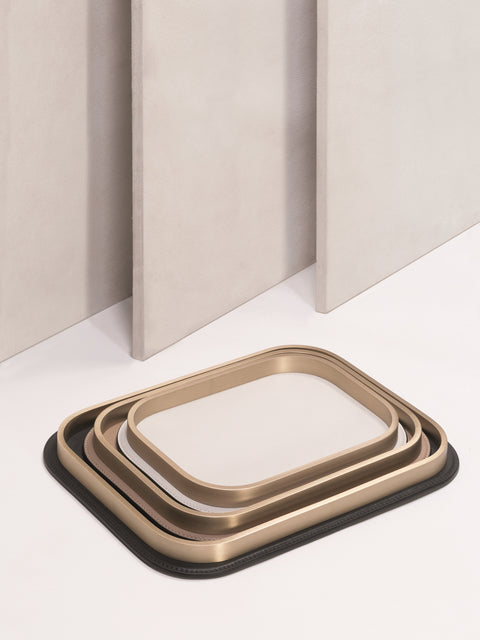 Regis Valet Tray by Giobagnara | Leather-covered metal base with metal frame | Available in three metal finishes | Shapes: square, rectangular, round, long rounded | Home Decor and Serveware | 2Jour Concierge, your luxury lifestyle shop







