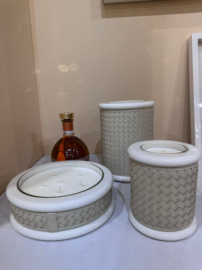 Riviere Maia | Candle Holder: Handwoven leather with lacquered wood and lacquer rings, available in multiple sizes, refined craftsmanship for display or use | Decor / Vases & Candle Holders | 2Jour Concierge, your luxury lifestyle shop | luxury interiors, hospitality décor, elegant living, designer home accessories, boutique hotels, refined lifestyle, yacht décor