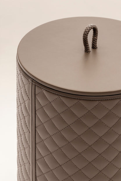 Riviere Ivo | Round Bin: Leather with varnished wood lining, offered in handwoven, herringbone, diamond, or lines quilted patterns, in two height options, with matching lid and acrylic lining accessories | Office + Tech / Bins | 2Jour Concierge, your luxury lifestyle shop | luxury interiors, hospitality décor, elegant living, designer office accessories, boutique hotels, refined lifestyle, yacht décor, executive interiors