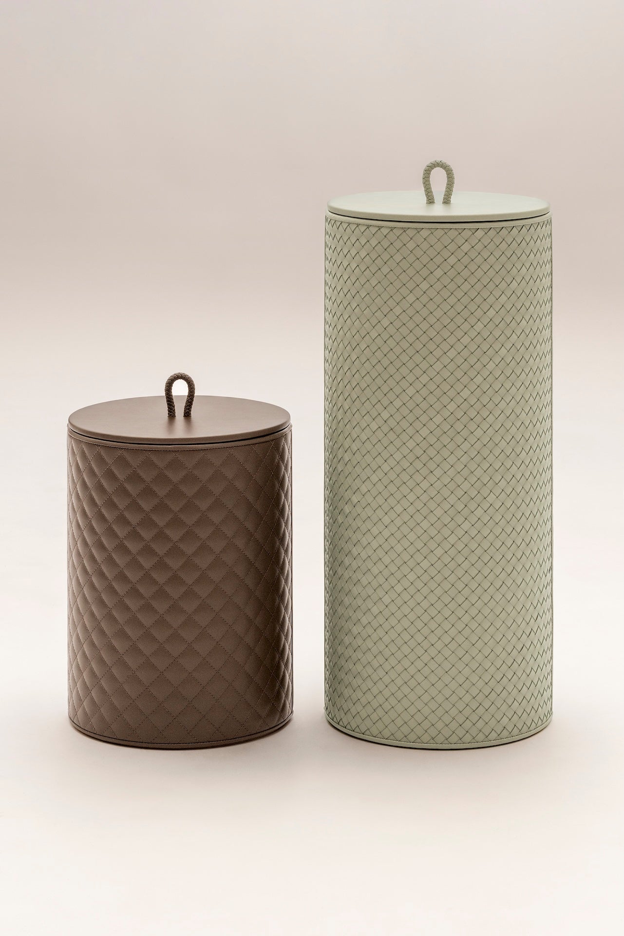 Riviere Ivo | Round Bin: Leather with varnished wood lining, offered in handwoven, herringbone, diamond, or lines quilted patterns, in two height options, with matching lid and acrylic lining accessories | Office + Tech / Bins | 2Jour Concierge, your luxury lifestyle shop | luxury interiors, hospitality décor, elegant living, designer office accessories, boutique hotels, refined lifestyle, yacht décor, executive interiors