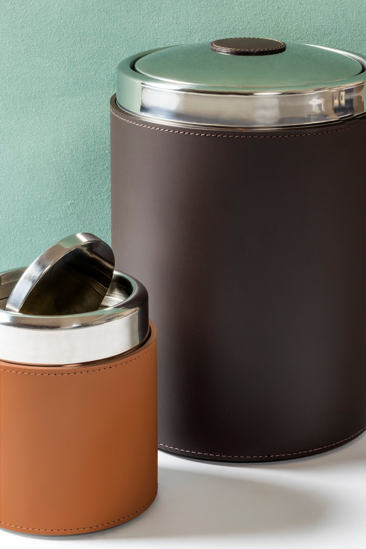 Rudi Perry | Bin: Cylindrical bin in regenerated leather with stainless steel structure and swing lid, combining functional hygiene with refined bathroom aesthetics | Bathroom / Bins | 2Jour Concierge, your luxury lifestyle shop