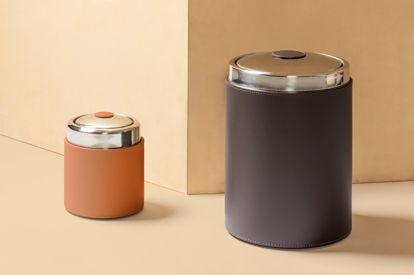 Rudi Perry | Bin: Cylindrical bin in regenerated leather with stainless steel structure and swing lid, combining functional hygiene with refined bathroom aesthetics | Bathroom / Bins | 2Jour Concierge, your luxury lifestyle shop