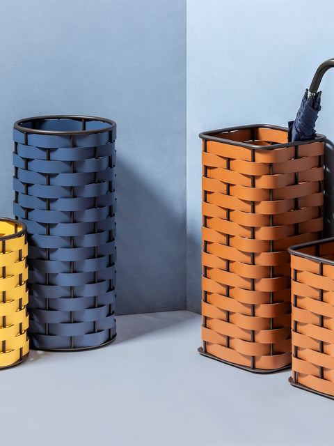 Rudi Nassa | Basket: Regenerated leather with woven structure, dark-stained aluminum frame, and smooth, matte finish, ideal for storing laundry, towels, or magazines, suitable for indoor or outdoor use | Storage / Storage Baskets & Boxes | 2Jour Concierge, your luxury lifestyle shop