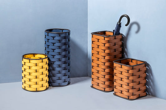 Rudi Nassa | Basket: Regenerated leather with woven structure, dark-stained aluminum frame, and smooth, matte finish, ideal for storing laundry, towels, or magazines, suitable for indoor or outdoor use | Storage / Storage Baskets & Boxes | 2Jour Concierge, your luxury lifestyle shop