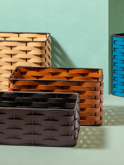 Rudi Nassa | Basket: Regenerated leather with woven structure, dark-stained aluminum frame, and smooth, matte finish, ideal for storing laundry, towels, or magazines, suitable for indoor or outdoor use | Storage / Storage Baskets & Boxes | 2Jour Concierge, your luxury lifestyle shop