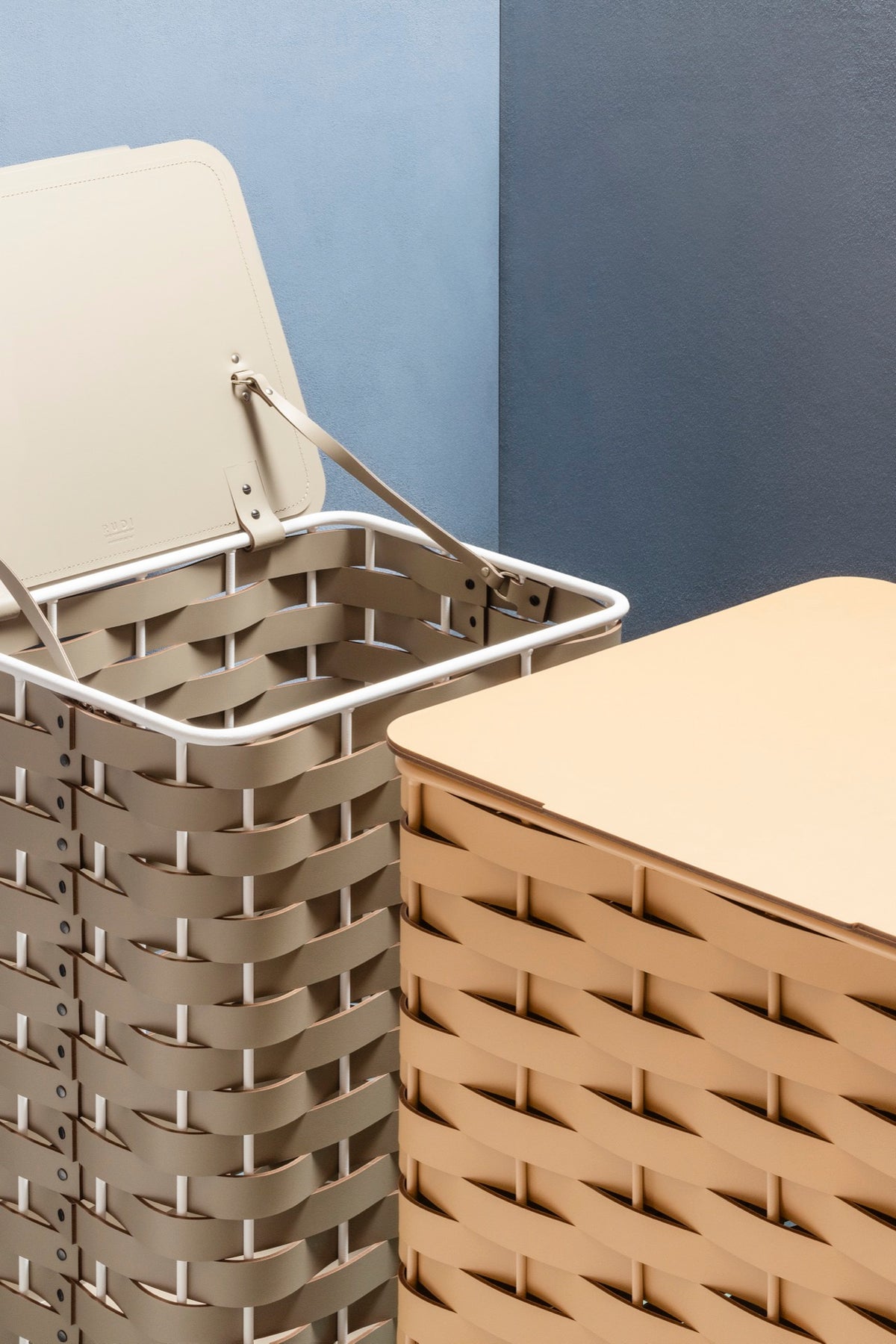 Rudi | Nassa Regular Laundry Basket: Dark-stained aluminum structure with Tecnocuoio® weaving — two sizes with or without lid, rubber feet or wheels | Storage | 2Jour Concierge, your luxury lifestyle shop | luxury laundry basket, Rudi Nassa, Tecnocuoio basket, designer laundry hamper, indoor outdoor basket