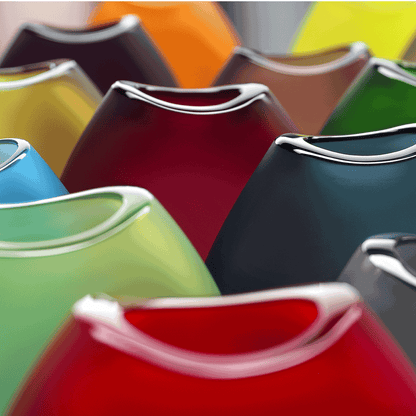 NasonMoretti Swing vase – medium & large | Hand-blown Murano glass vases with dynamic silhouettes and vibrant color options | Available in medium and large sizes to suit different interior styles | A sculptural accent piece that combines playful energy with refined Italian craftsmanship | Design by NasonMoretti | Home decor & vases | 2Jour Concierge, your luxury lifestyle shop