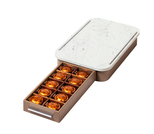 Giobagnara Saint-Germain coffee drawer organizer – marble | Compact organizer for Nespresso professional capsules | Leather-covered wood structure with metal inserts in three finishes | Top in marble, available in classic travertine or arabescato white | Inner walnut wood partitions hold 30 capsules | Custom sizes available on request | Coffee accessories | 2Jour Concierge, your luxury lifestyle shop