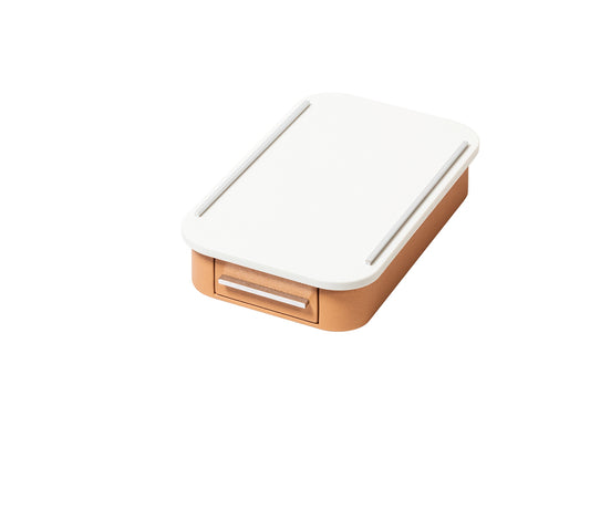 Giobagnara Saint-Germain coffee drawer organizer – corian | Compact organizer for Nespresso professional capsules | Leather-covered wood structure with metal inserts in three finishes | Top in refined Corian® for a sleek and durable surface | Inner walnut wood partitions hold 30 capsules | Custom sizes available on request | Coffee accessories | 2Jour Concierge, your luxury lifestyle shop