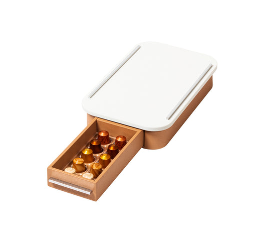 Giobagnara Saint-Germain coffee drawer organizer – corian | Compact organizer for Nespresso professional capsules | Leather-covered wood structure with metal inserts in three finishes | Top in refined Corian® for a sleek and durable surface | Inner walnut wood partitions hold 30 capsules | Custom sizes available on request | Coffee accessories | 2Jour Concierge, your luxury lifestyle shop