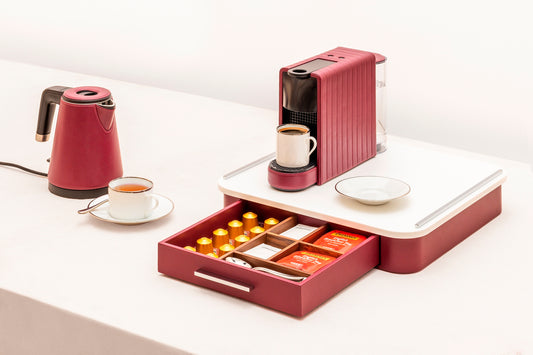 Giobagnara Saint-Germain coffee and tea drawer organizer – corian | Elegant drawer organizer for Nespresso classic capsules and tea bags | Leather-covered wood structure with metal inserts in three finishes | Top in refined Corian® for a sleek, contemporary look | Inner walnut wood partitions hold coffee spoons, sugar, 10 capsules, and tea bags | Custom sizes available on request | Coffee accessories | 2Jour Concierge, your luxury lifestyle shop