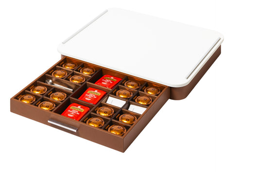 Pigment France × Gio Minelli Saint-Germain Deluxe Coffee and Tea Drawer Organizer | Leather-covered wood drawer with internal dividers and metal details, customizable in marble, Corian®, or leather top | Serveware + Hospitality / Coffee & Tea Organizers | 2Jour Concierge, your luxury lifestyle shop | luxury interiors, hospitality décor, refined lifestyle, executive interiors, boutique hotels, yacht décor, elegant living, designer home accessories