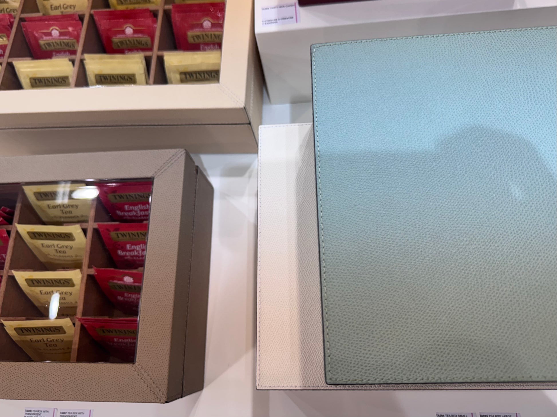 Giobagnara | Tea Box with Transparent Plexiglass Lid: Leather-covered aged cedar box with clear plexiglass top and removable 12-compartment divider | Serveware + Hospitality / Coffee & Tea Organizers | 2Jour Concierge, your luxury lifestyle shop | refined tea presentation, elegant service accessories, hotel suites, and private residences