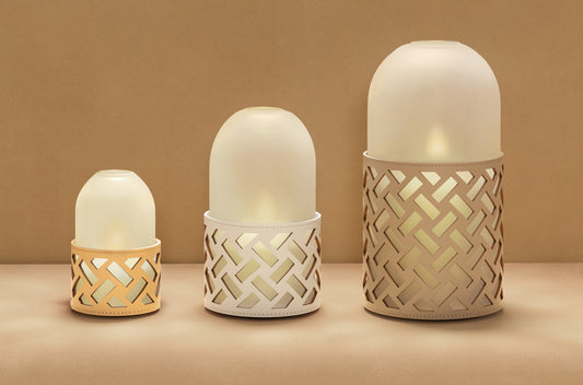 Hotaru N°2 Lantern by RUDI | Finest regenerated leather base with a perforated dynamic motif | Water-resistant and UV-resistant finish | Removable frosted borosilicate glass cap for a subtle, diffused glow | Versatile accent piece to create enchanting atmospheres | Home Decor and Lighting | 2Jour Concierge, your luxury lifestyle shop






