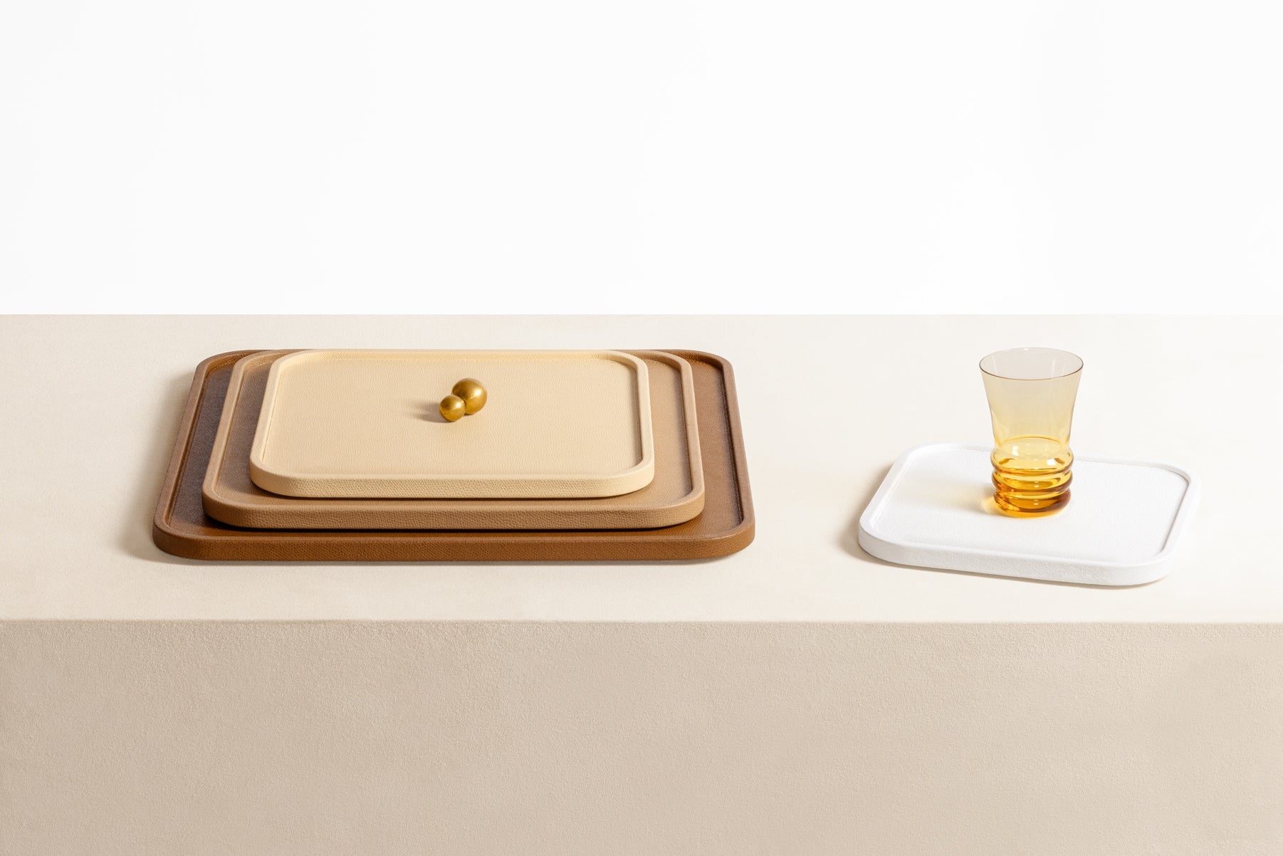 Giobagnara Arcobaleno Tray | Leather-covered | Available in square and rectangular shapes | Arcobaleno expresses the infinite diversity of color with unlimited combinations, from bold brights to subtle nuances | Elegant and customizable serving tray | Home Decor and Accessories | 2Jour Concierge, your luxury lifestyle shop