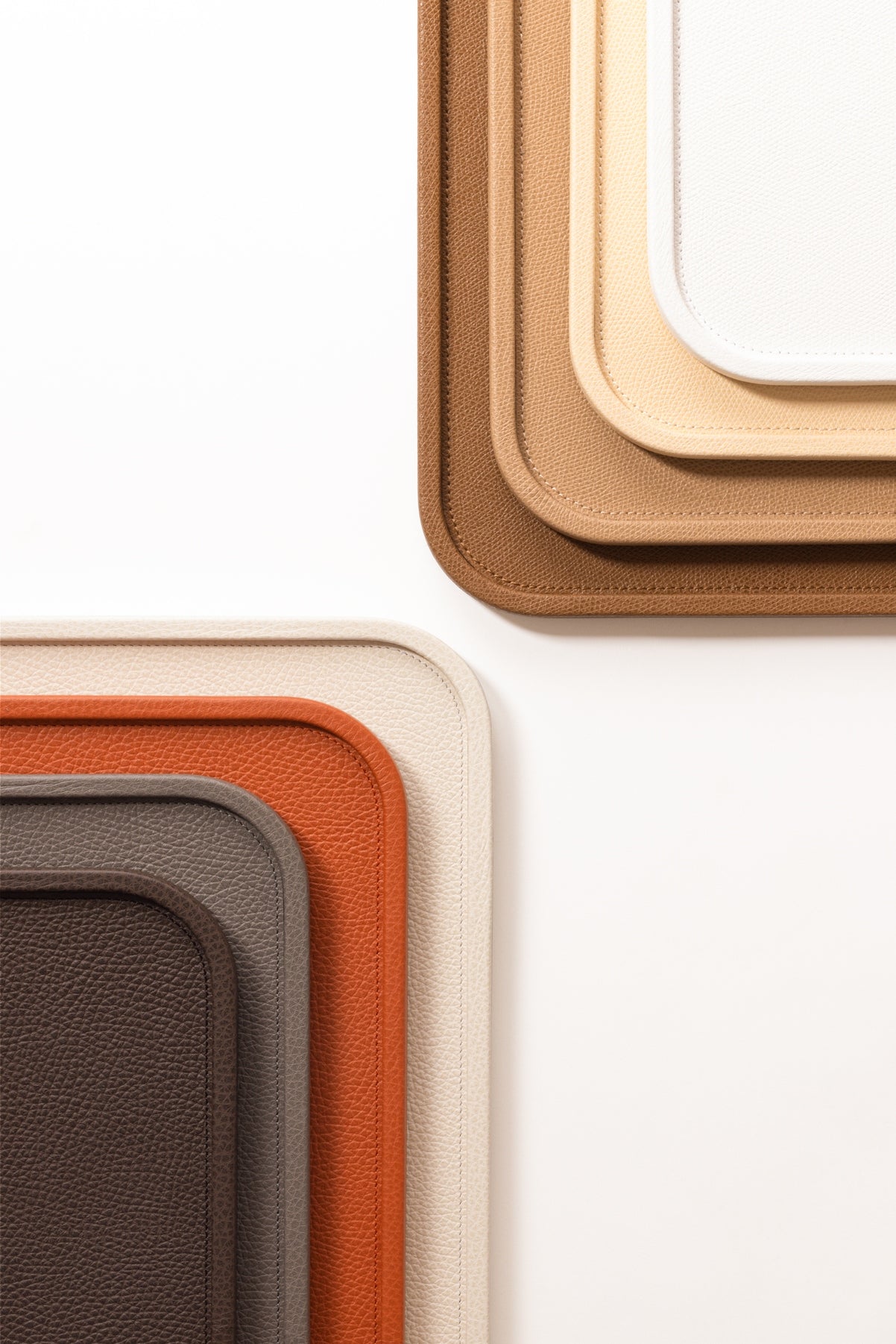 Giobagnara Arcobaleno Tray | Leather-covered | Available in square and rectangular shapes | Arcobaleno expresses the infinite diversity of color with unlimited combinations, from bold brights to subtle nuances | Elegant and customizable serving tray | Home Decor and Accessories | 2Jour Concierge, your luxury lifestyle shop