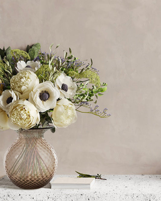 Venini Balloton Fiori Vase | An elegant Murano glass vase designed to accommodate larger floral compositions | Handcrafted using a unique artisanal process that recreates the matelassé effect in glass | Featuring the signature balloton texture and delicate floret-inspired details | Introduced in 2024, this refined piece continues the poetic tradition of Venini’s iconic Balloton collection | Design by Venini | Tableware & decorative objects | 2Jour Concierge, your luxury lifestyle shop